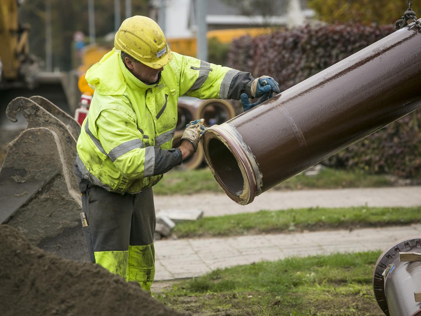 Aquafin medewerker op een werf in Sint-Niklaas